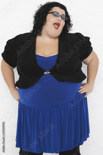 Photo: Overweight Woman Winking, portrait Overweight Woman Winking, portrait