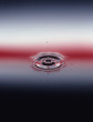Droplets Hitting Water, causing ripples, close-up