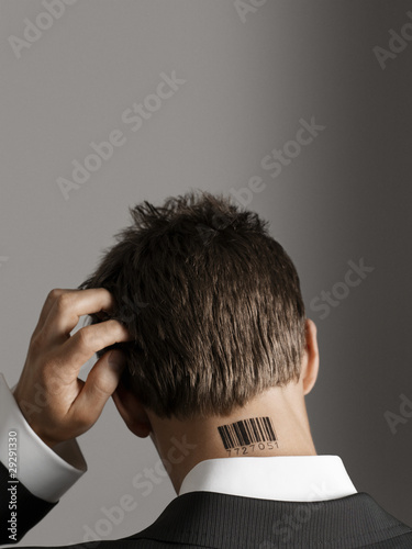 bar code tattoos. Young man with ar code tattoo