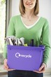 Woman Carrying Box with Recycleables