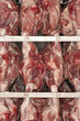 Raw Meat Hanging on Rack