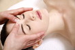 Woman having facial massage