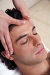 Man having facial massage Man having facial massage