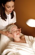 Woman having a facial treatment at a spa