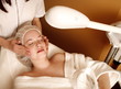 Woman having a facial treatment at a spa Woman having a facial treatment at a spa