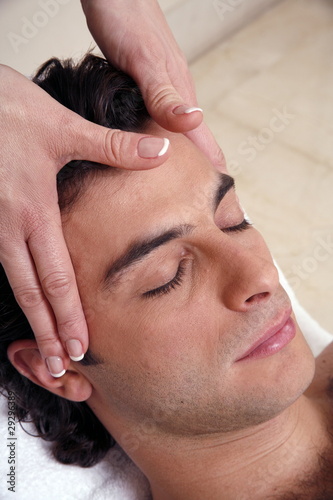 Photo: Man having facial massage Man having facial massage