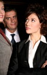  Three business people in an elevator