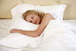 Woman sleeping in bed
