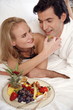 Couple relaxing in bed