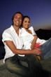 Couple sitting on terrace with a view