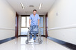 Male nurse with a wheelchair