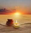 stack of stones and candle light