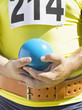 Athlete holding shot-put ball