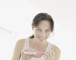 A woman doing her nails