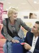 Couple looking at couches in store