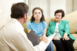 Teen and Mom Meet Psychologist