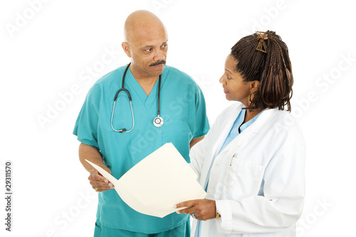 Photo: Medical Doctors Reading Chart Medical Doctors Reading Chart