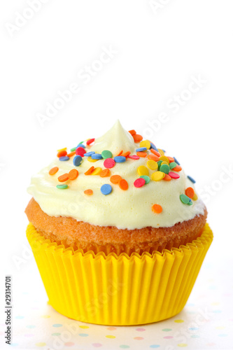 Photo: Closeup of cupcake on white isolated background Closeup of cupcake on white isolated background