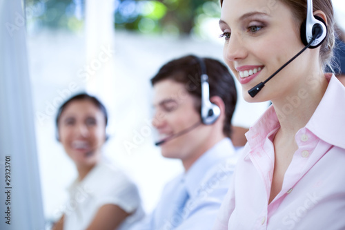 Photo: People working at a call center People working at a call center