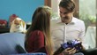 man giving present to girlfriend