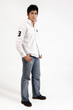 teenage boy in jeans and white shirt