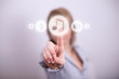 Woman pressing music media button Woman pressing music media button