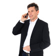 Attraktiver Geschäftsmann führt ein Telefonat.