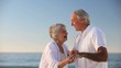 Elderly woman dancing with her husband