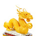 Golden dragon statue isolated