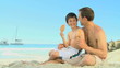 Boy and his father eating icecream