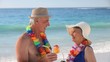 Elderly couple talking with cocktails
