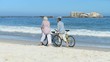 Video: Aged couple walking with bikes Aged couple walking with bikes