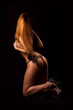 Nude young woman with gun Nude young woman with gun
