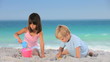 Children building a sand castle
