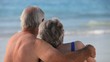 Senior couple looking at the ocean