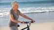 Mature woman waiting with a bike