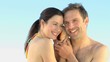 Couple listening to a seashell