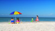 Young Family Enjoying a Beach Vacation filmed 60FPS