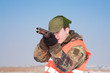 Hunter aiming at the hunt during a hunting party Hunter aiming at the hunt during a hunting party