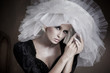 Portrait of young blonde beauty with sensual pose