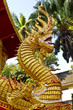 Naga or Nak statue infront of Buddhist church