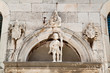 Statue of the saint placed over the entrance to the old church Statue of the saint placed over the entrance to the old church