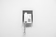 telephone hanging on the wall