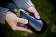 A man holding an aubergine, close-up
