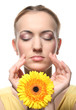 Photo: Beautiful young woman with gerber flower Beautiful young woman with gerber flower