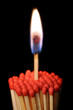 Group of matchsticks isolated on black background