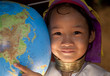 Thailand, Mae Hong Son, girl pointing on globe.