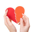 Valentine's day heart stitched from two halves in woman's hands