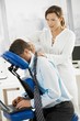 Businessman getting massage in office