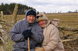 Senior couple resting during a walk